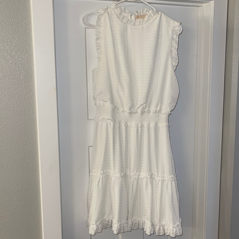 Sleeveless white dress